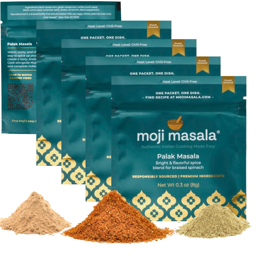 Multiple packages of moji masala Palak Masala with spice samples on a white background
