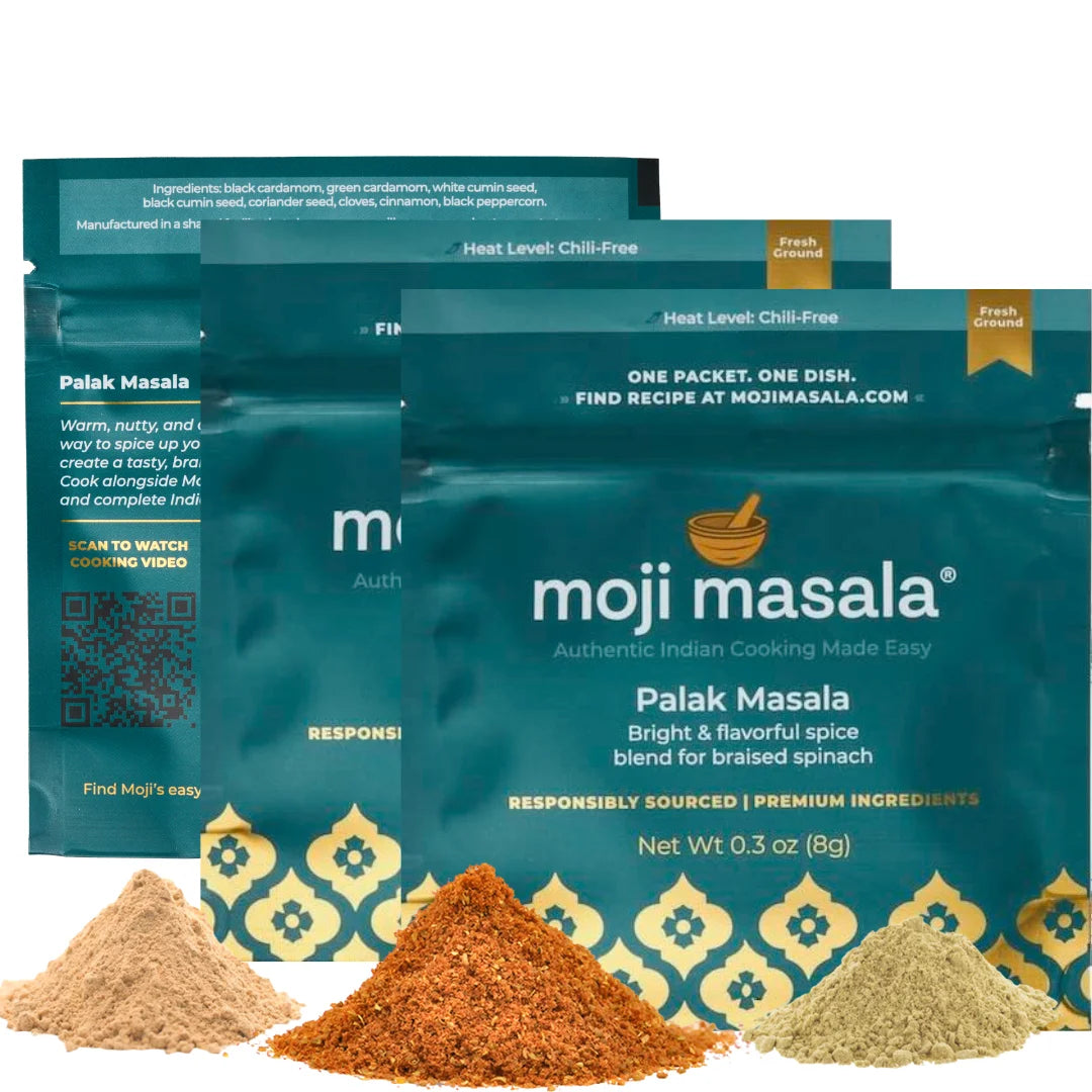 Three packages of moji masala Palak Masala spice mix with visible spices on a white background.